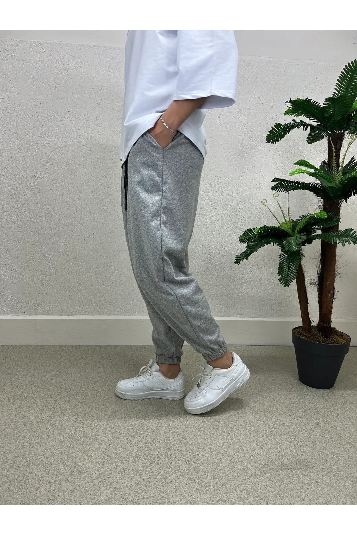 Erkek Açık Gri Beli ve Paçası Lastikli Bol Kesim Cepli Jogger Eşofman Altı HZL24S-MXC8989-211