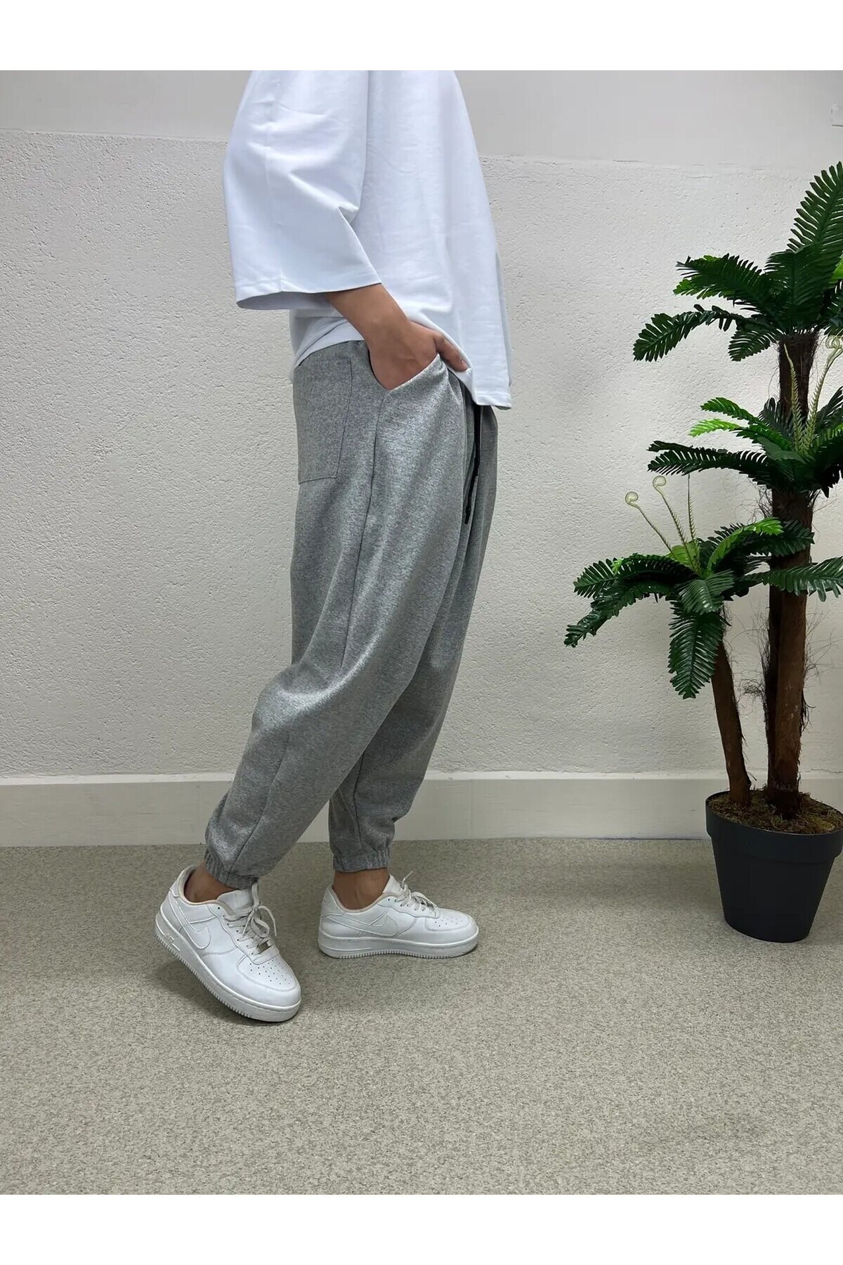 Erkek Açık Gri Beli ve Paçası Lastikli Bol Kesim Cepli Jogger Eşofman Altı HZL24S-MXC8989-211