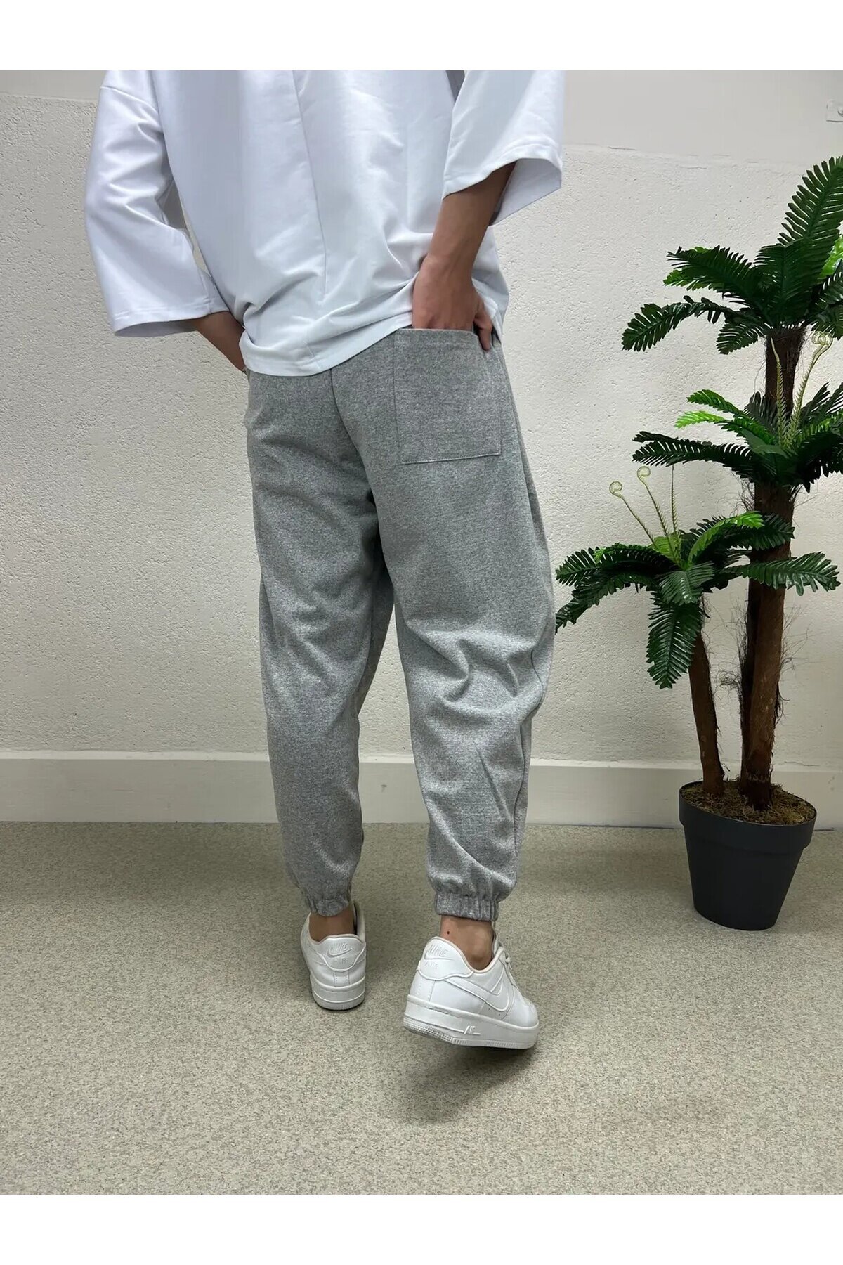 Erkek Açık Gri Beli ve Paçası Lastikli Bol Kesim Cepli Jogger Eşofman Altı HZL24S-MXC8989-211